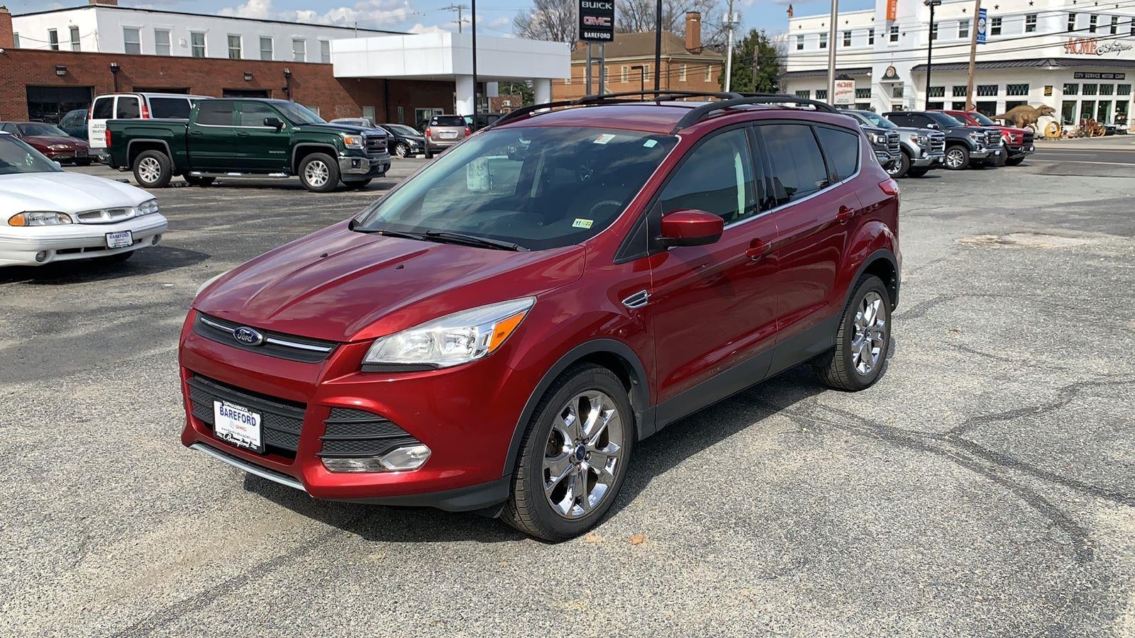2014 Ford Escape FWD 4dr SE in Red — front three-quarter view