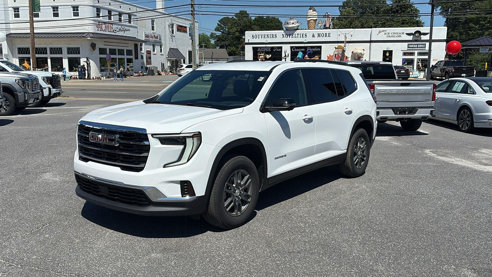 2025 GMC Acadia Elevation in Summit White — front three-quarter view