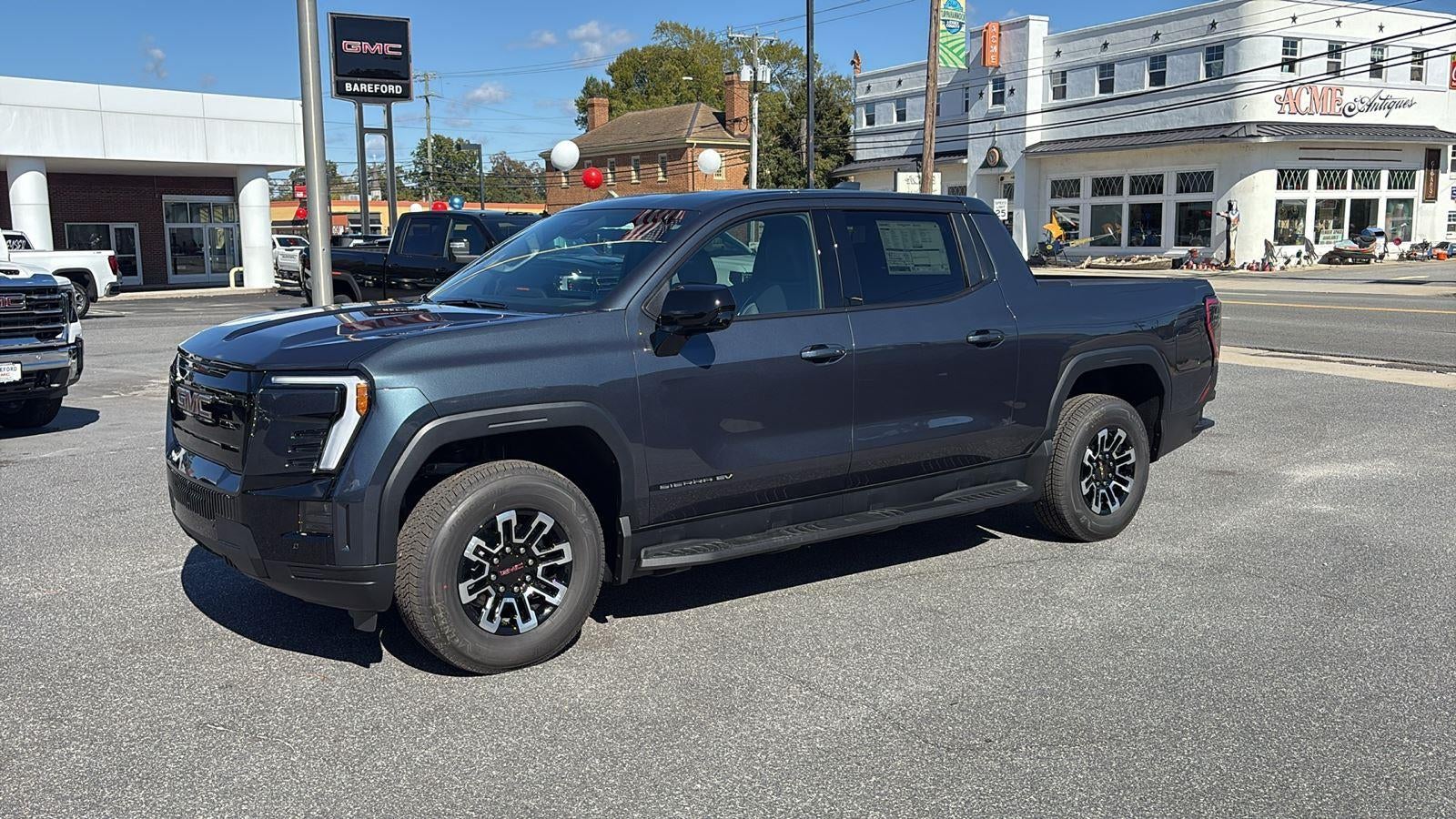 2026 GMC Sierra EV — side profile view