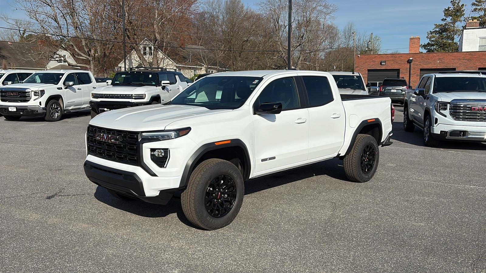 2026 GMC Canyon Elevation in Summit White — front three-quarter view
