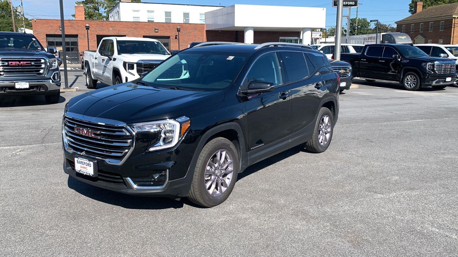 2023 GMC Terrain SLT in Ebony Twilight Metallic — front three-quarter view